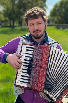 Humphrey playing the accordion